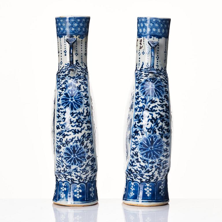 A pair of Chinese blue and white pilgrim vases, Qing dynasty, 19th Century.