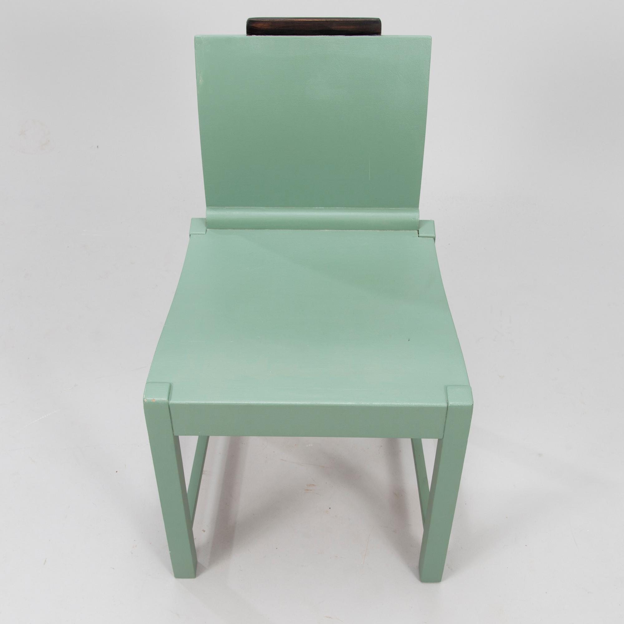 ERIK BRYGGMAN, A wooden chair, 1920's.