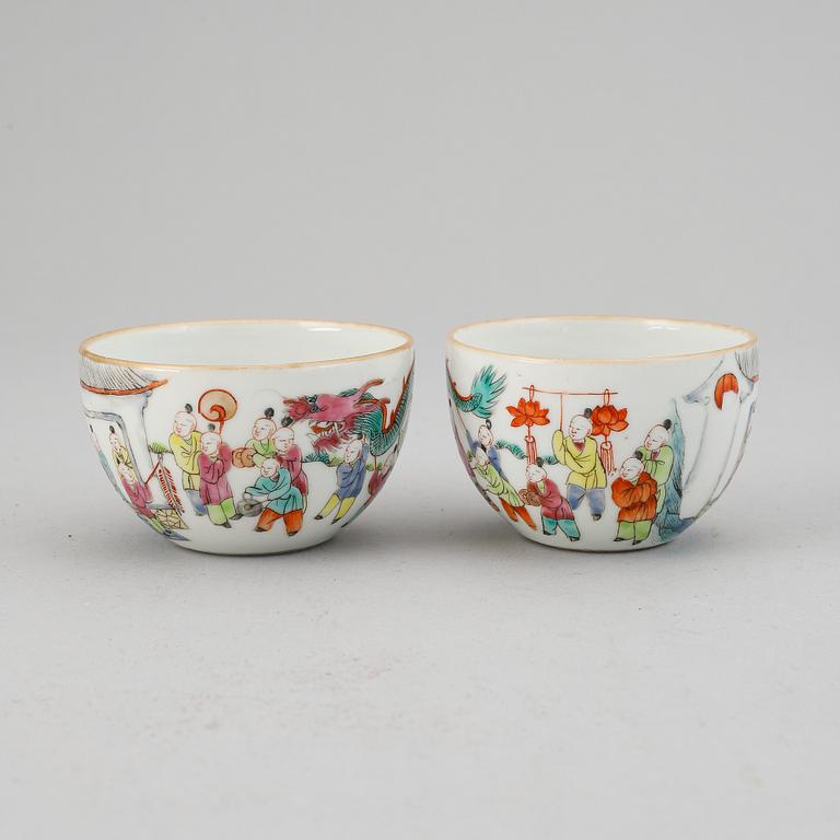 A pair fo famille rose "boys" cups, Qing dynasty late 19th Century.