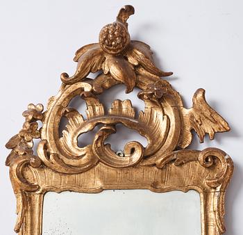 A pair of Danish rococo girandole mirrors.