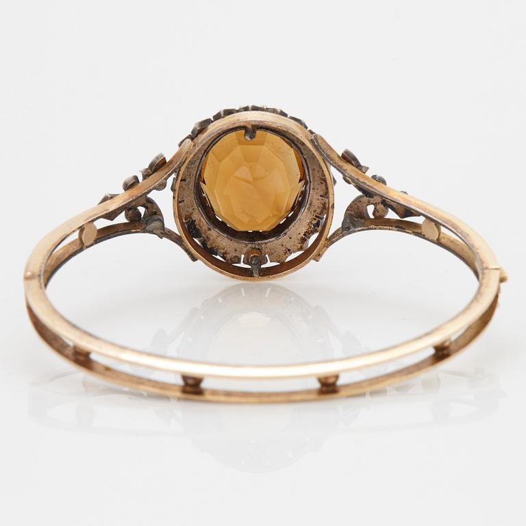 A BANGLE.
