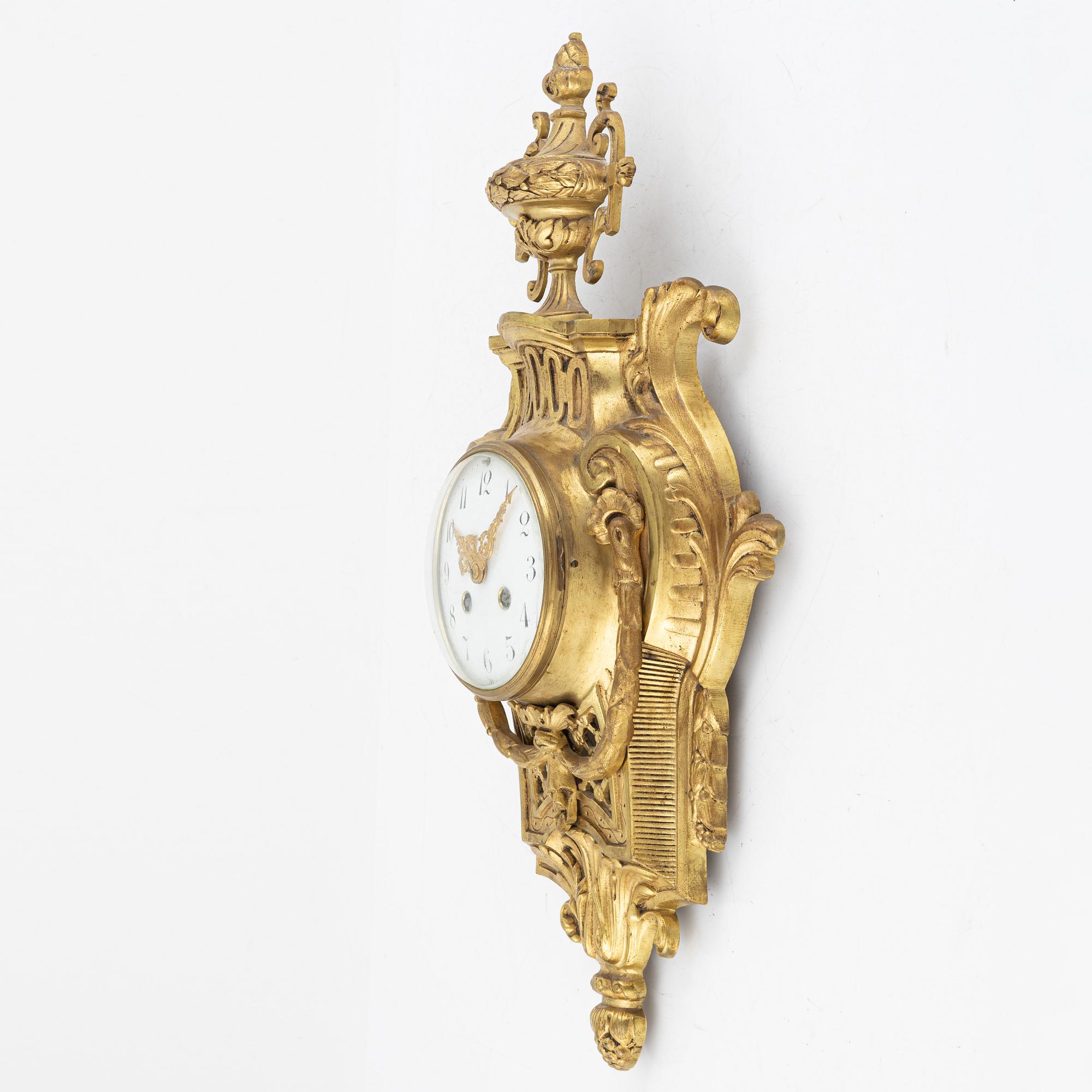 A Louis XVI-style wall clock, first half of the 20th Century.