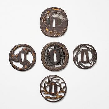 A set of five Japanese Tsubas, Edo period (1666-1868). One signed.