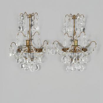 VÄGGLYSTRAR, ett par, gustaviansk stil, 1900-tal.