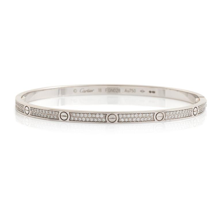 A Cartier "Love" bracelet small model in 18K white gold with round brilliant-cut diamonds.