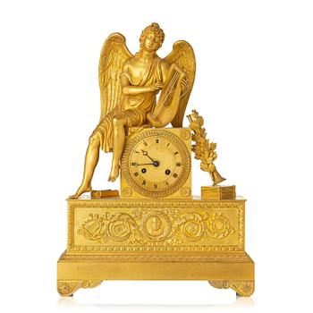 151. A figural Empire ormolu mantel clock, Paris, early 19th century.