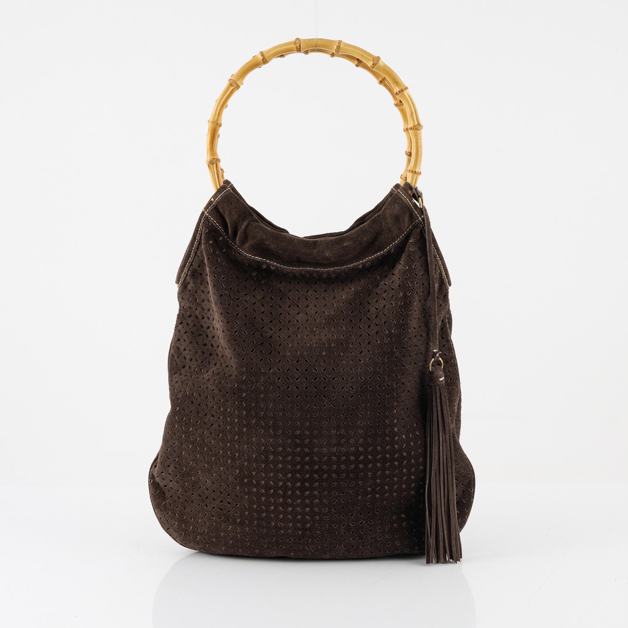 バッグ 90's MIU MIU Bamboo Handle Suede Bag Miu Miu, a brown suede handbag. - Bukowskis