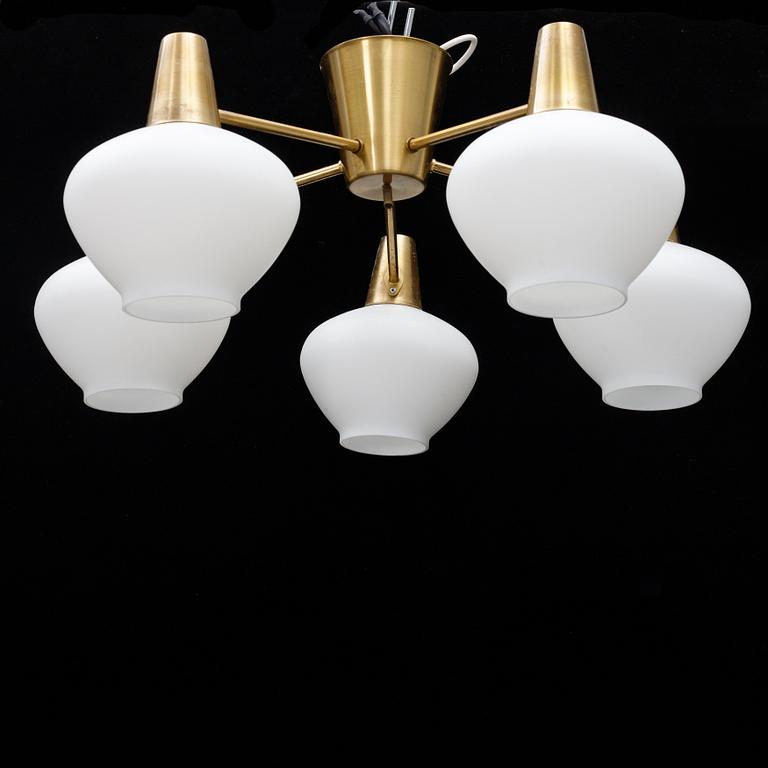 A mid 20th Century brass and glass ceiling light from Asea.