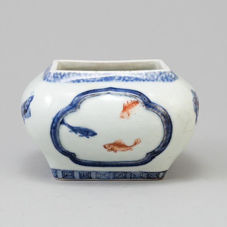 A Chinese underglazed blue and white with iron red porcelain pot, 20th century.