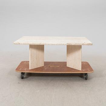 A late 20th century travertin coffee table.