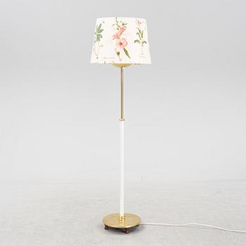 Josef Frank, a brass model 2564 floor lamp by Firma Svenskt Tenn.