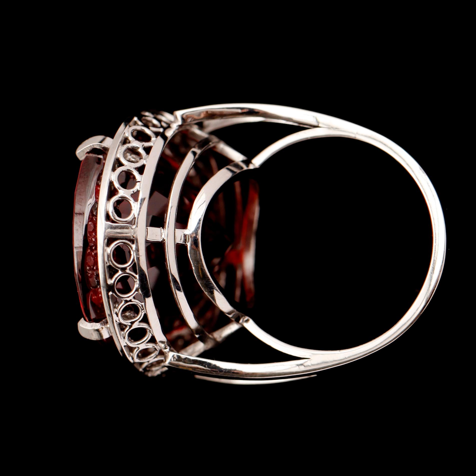 RING, 18 k vitguld, granat 63,5 ct, samt briljanter, VKJ, 2012.