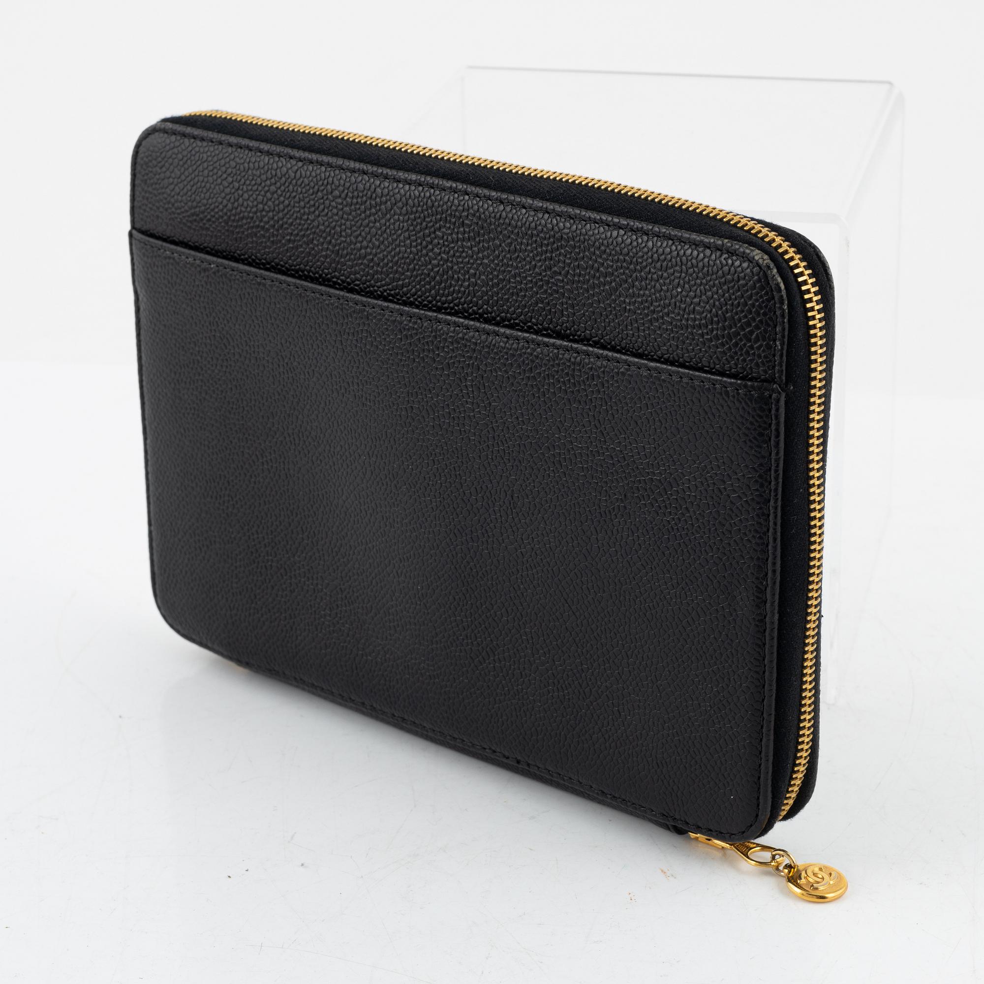 Chanel, A black caviar leather clutch, 1997 - 1999.