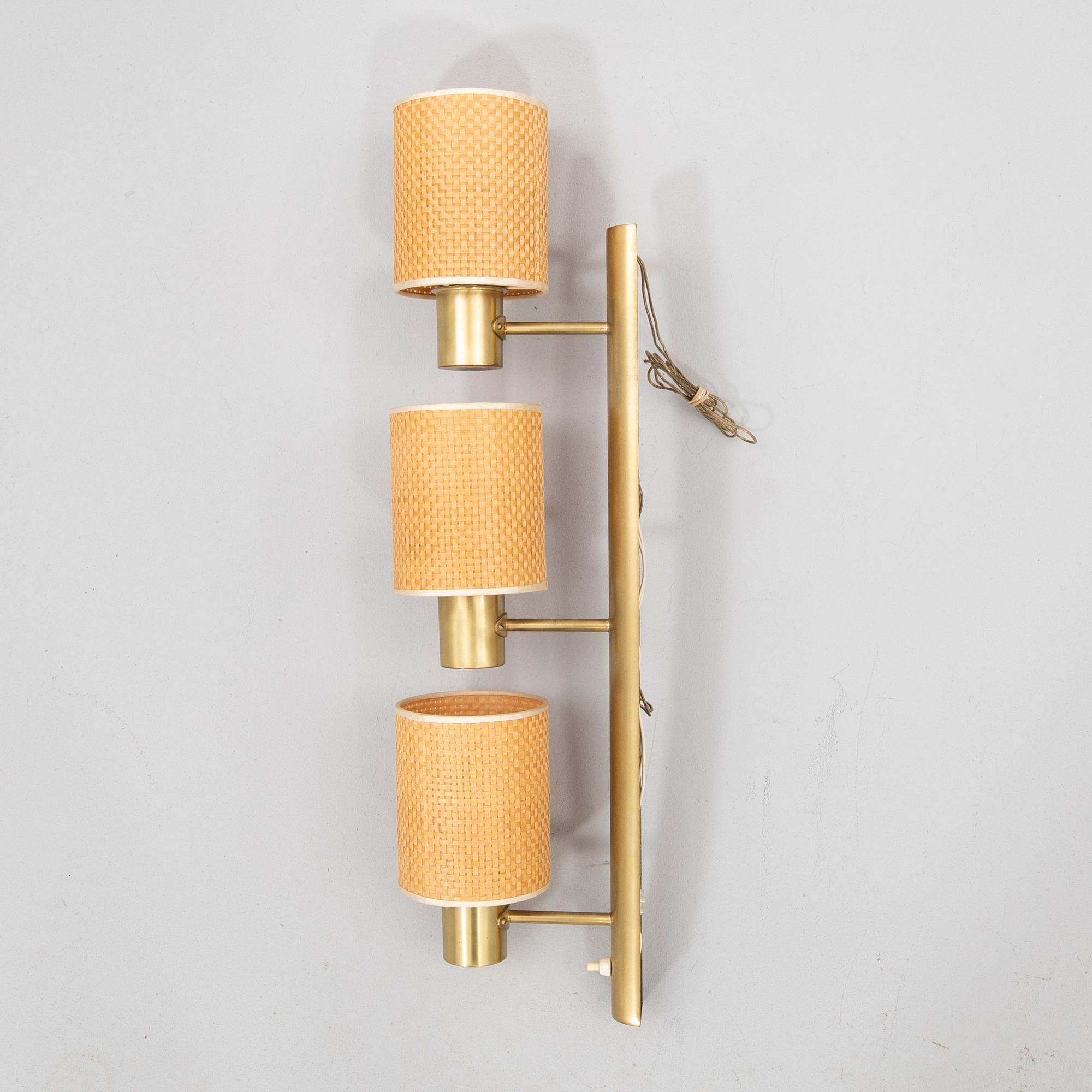 Hans-Agne Jakobsson, a brass wall lamp.