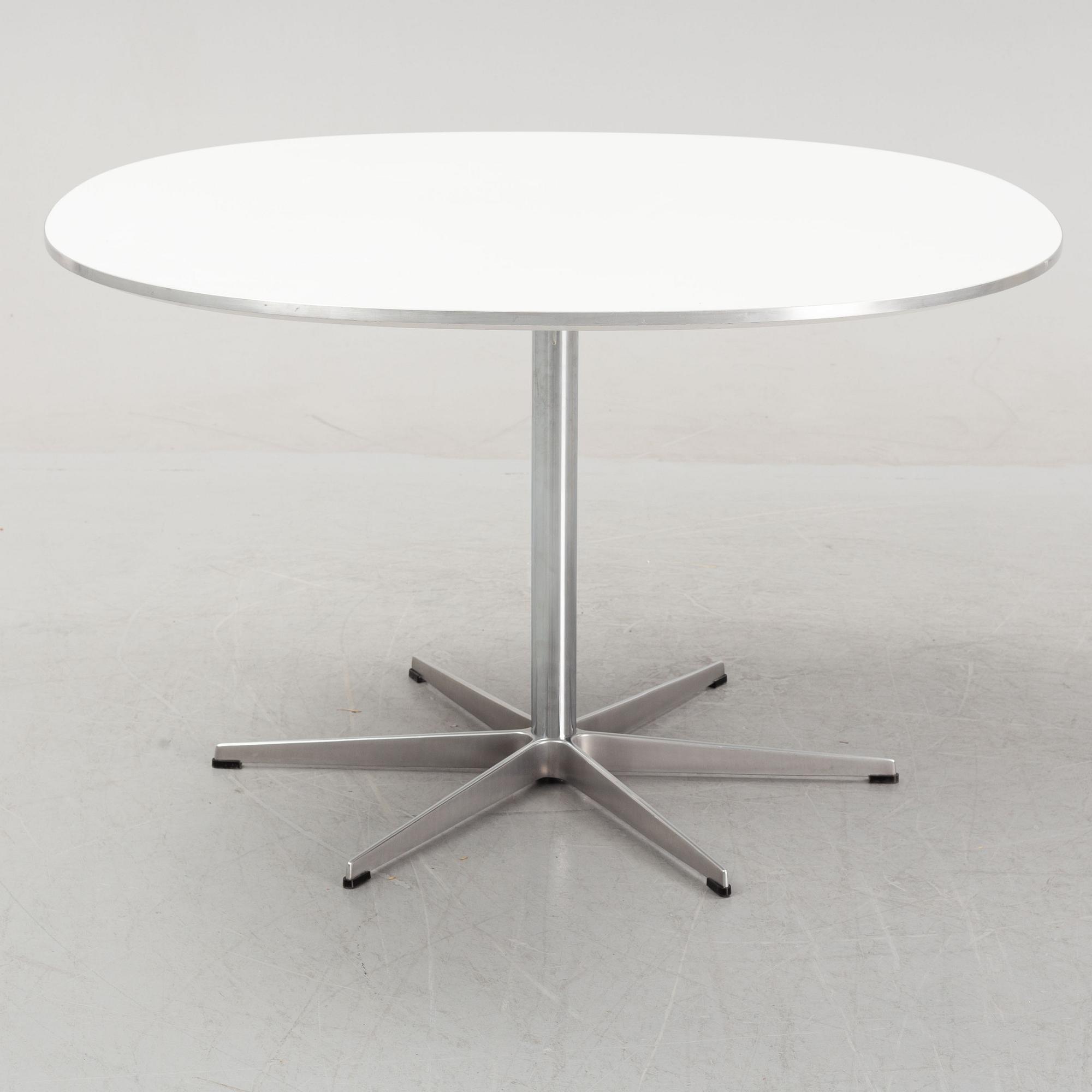 Arne Jacobsen, Bruno Mathsson & Piet Hein, a 'Supercircular' dining table from Fritz Hansen, designed 1968.