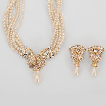 OSCAR DE LA RENTA, a necklace with white decorative pearls and clip earrings.