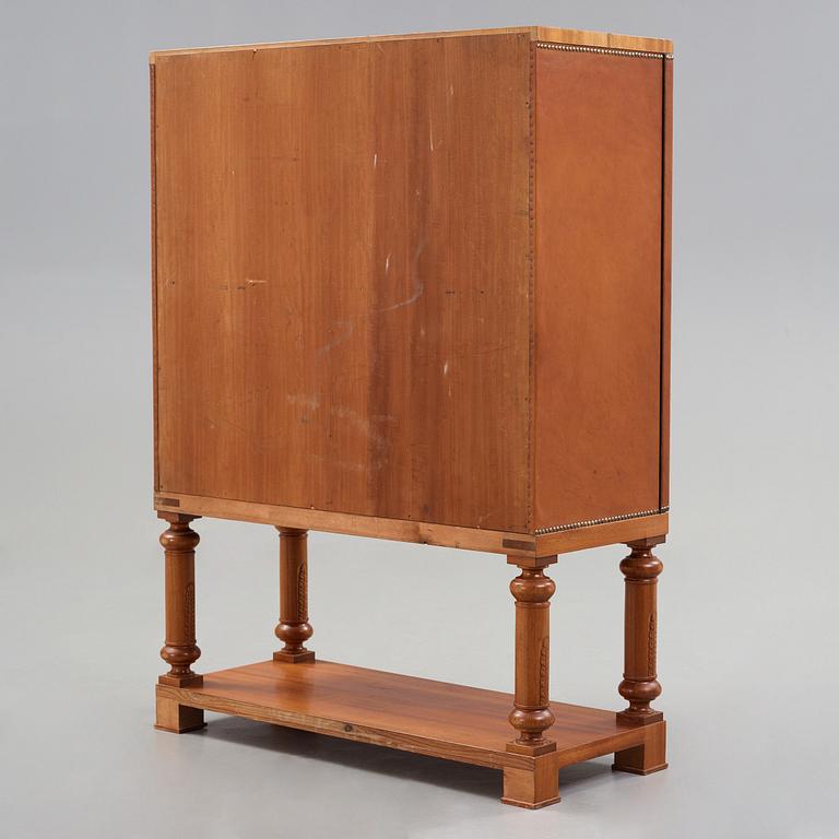 Otto Schulz, Boet, Gothenburg, probably, a cabinet covered with brown leather, dated 1942.