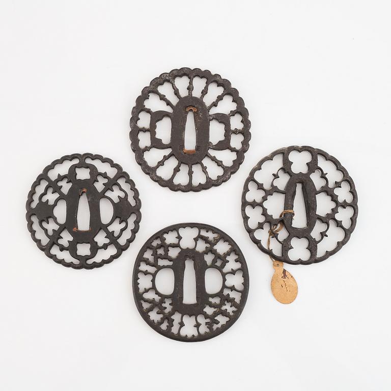 Four iron tsubas, Japan, Edo period.