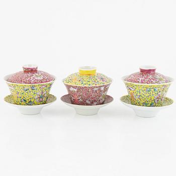 A group of three Chinese enamelled porcelain cups with covers and stands, three small dishes, 20th century.