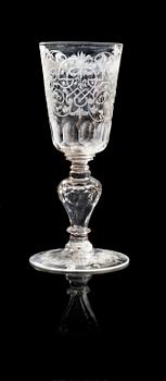 1184. An engraved Bohemian Rococo goblet, mid 18th Century.