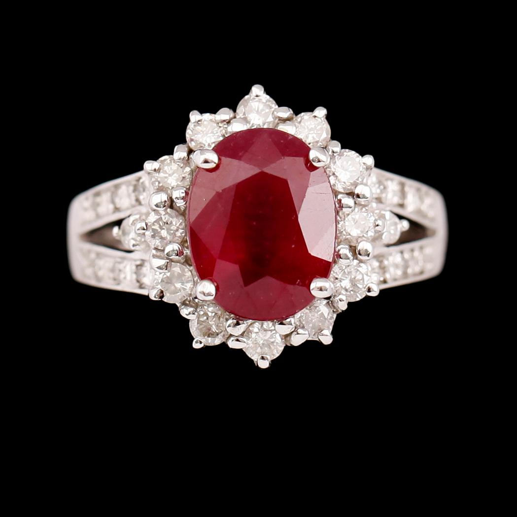 RING, 10 k vitguld, rubin 3.15 ct, briljantslipade diamanter tot 0.70 ct.