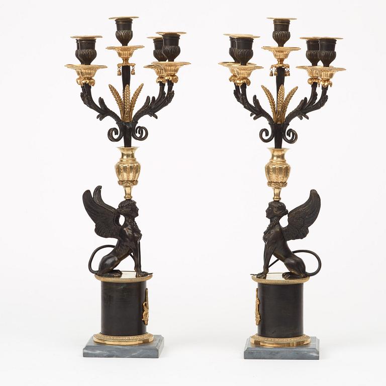 A pair of Russian Louis XVI-style 19th century five-light candelabra.