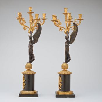 A pair of Empire-style late 19th century six-light candelabra.