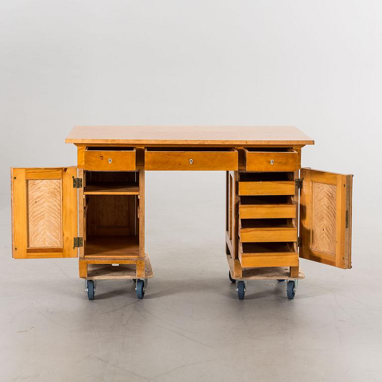 An early 20th century Karl Johan style birch writing table.