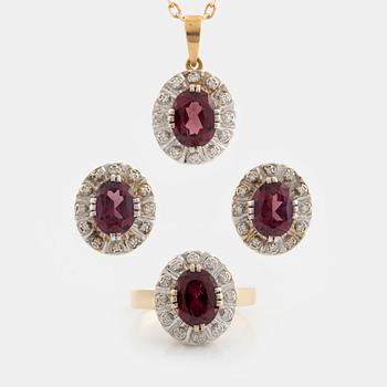 18K gold set with faceted garnets and eight-cut diamonds.
