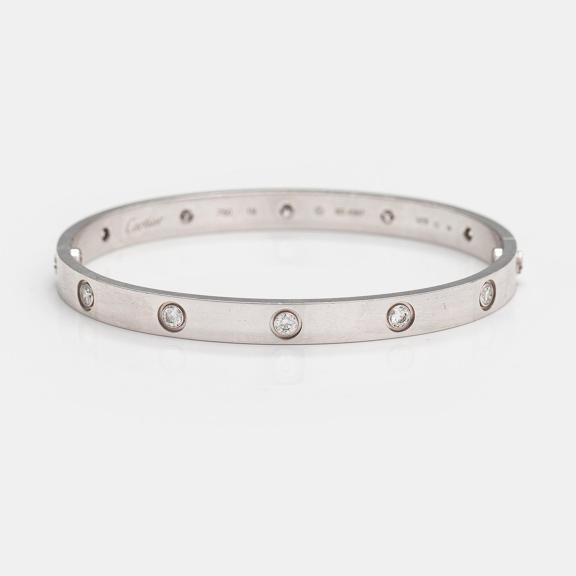 Cartier, "Love bracelet" an 18K white gold bracelet with diamonds ca. 0.96 ct in total. Marked Cartier, 19, SD4387.