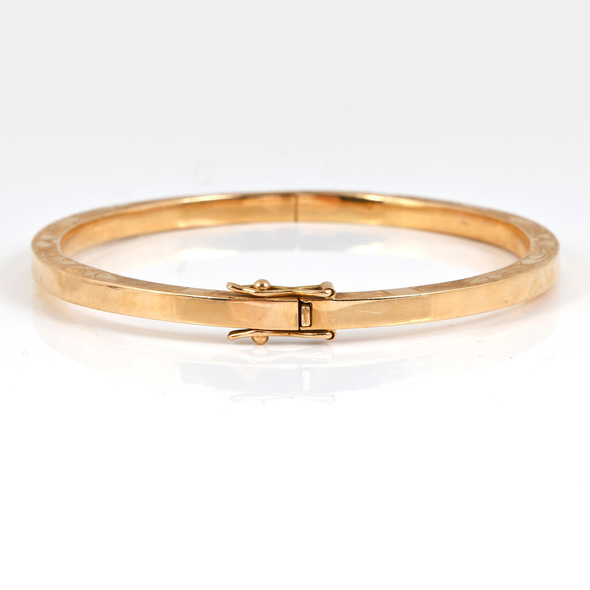 ARMBAND, 18 k guld. Vikt ca 8,76 g.