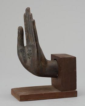A  Thai bronze Buddha hand.