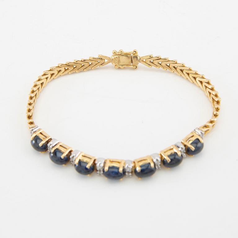 Armband 18K guld med cabochonslipade safirer och diamanter.