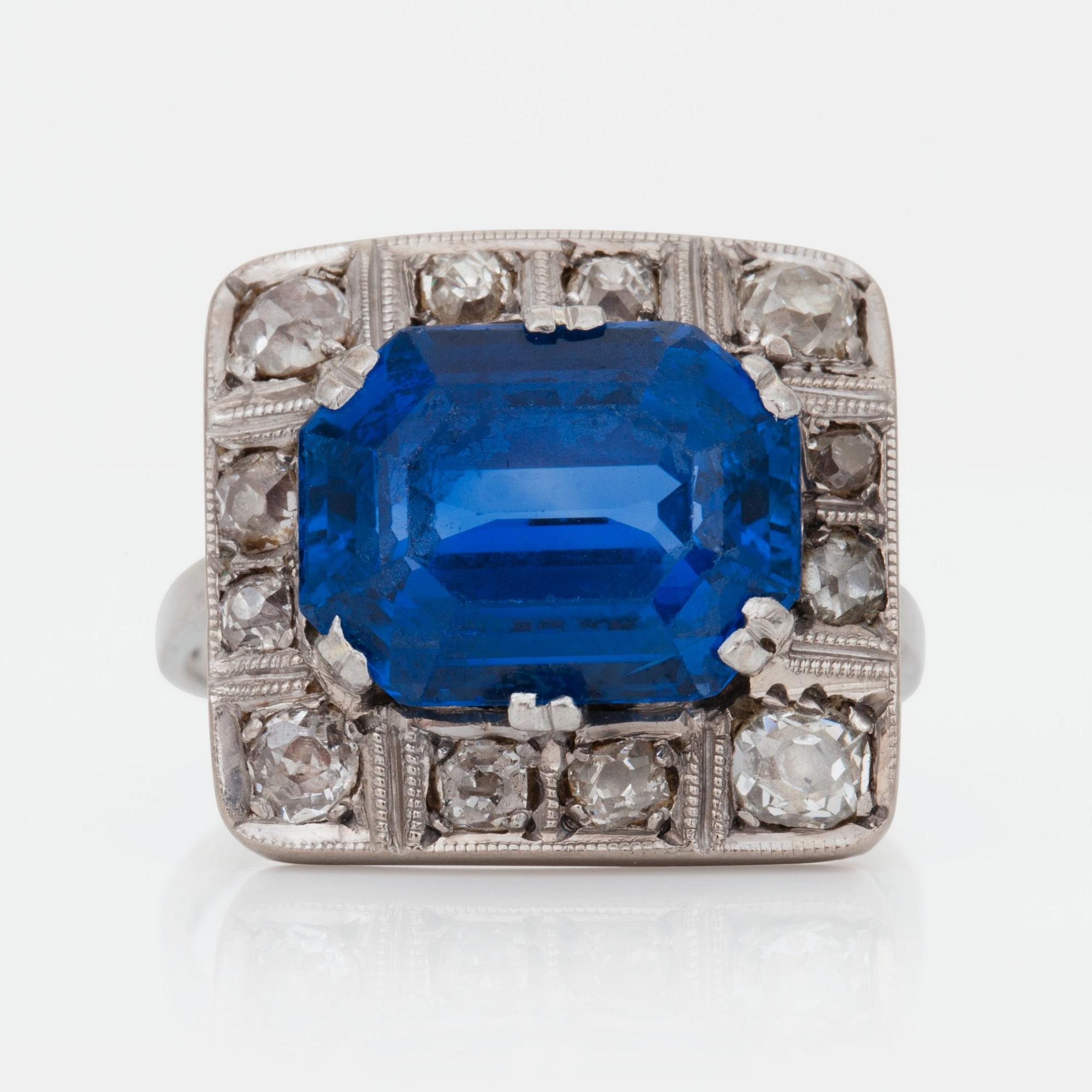 A natural sapphire, circa 7.00 cts, and antique-cut diamond ring.