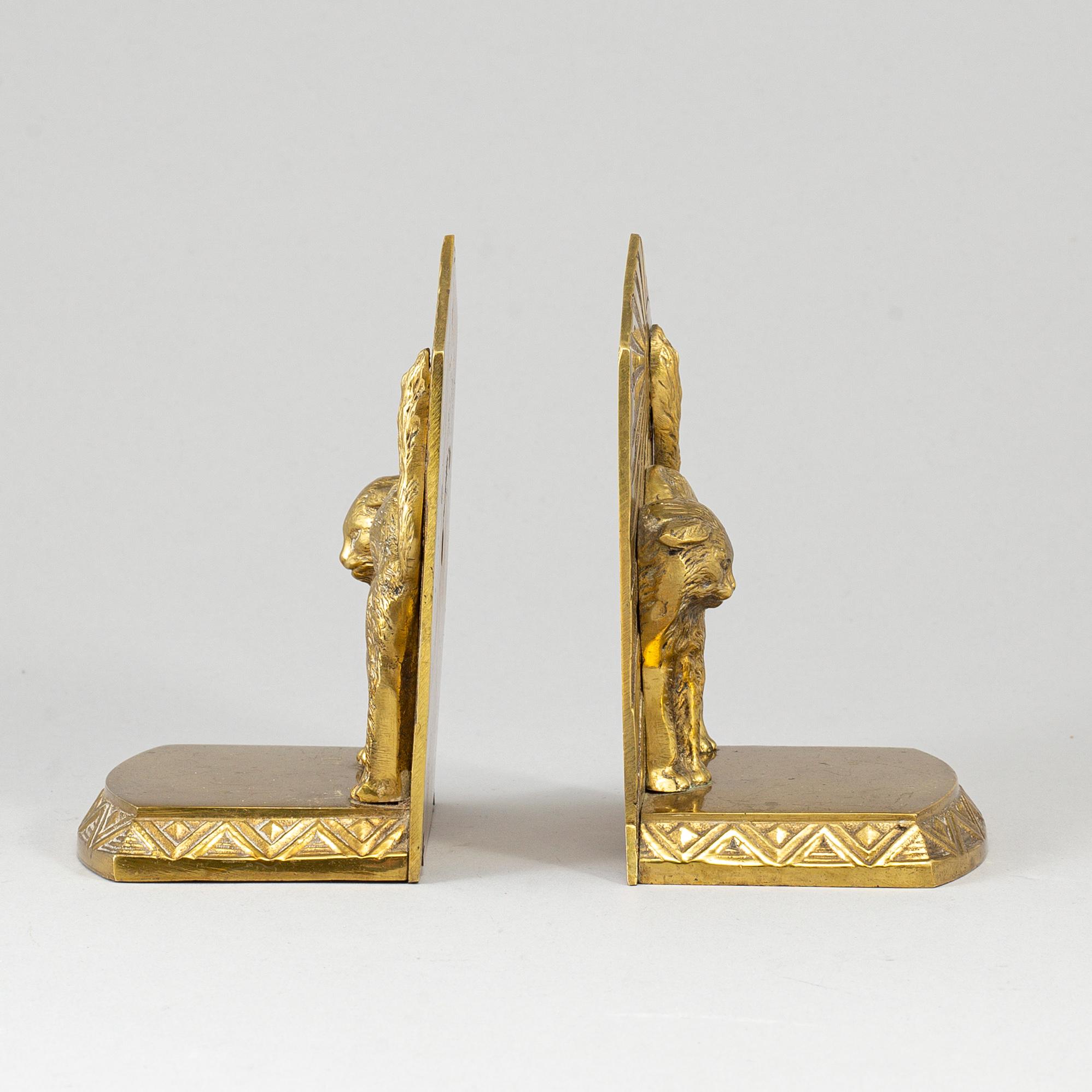 A pair of art déco bronze book ends, 1930s.