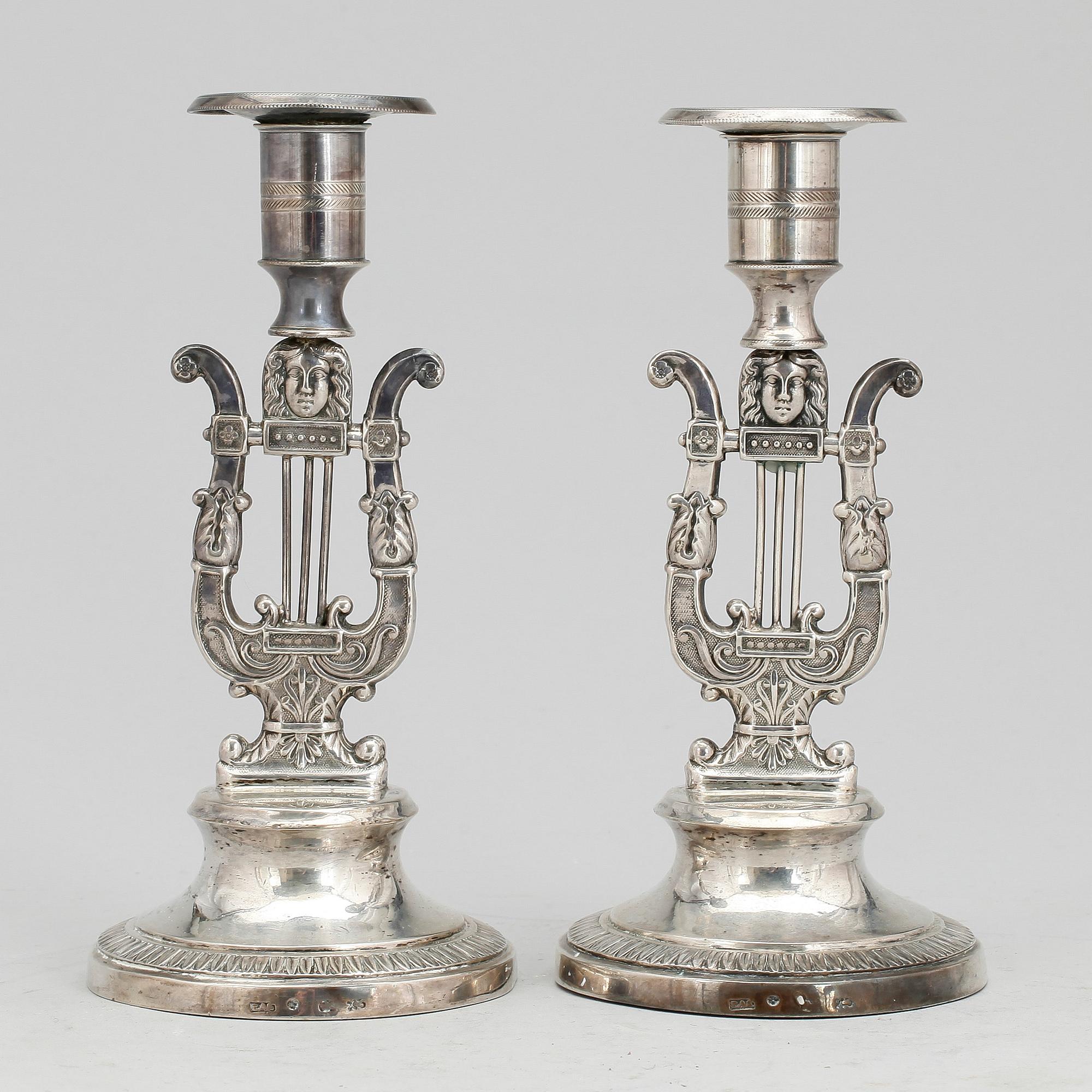 LJUSSTAKAR, ett par, silver, Petter Adolf Sjöberg, Stockholm 1828. Empire.