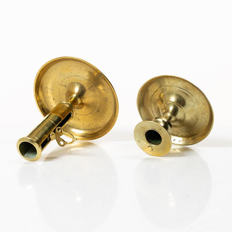 Candelabra, 4 pcs, and a chamberstick for two candles, brass, 19th century.