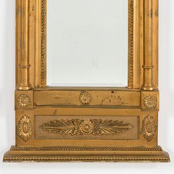 An empire mirror, first half of the 19th century.