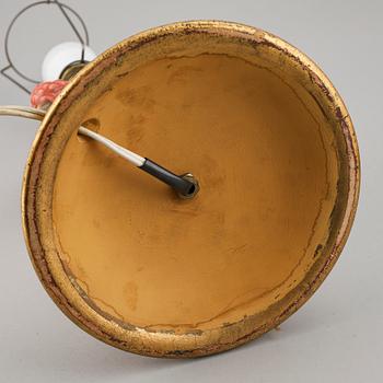 A German porcelain and wooden table lamp, 1930/40s.