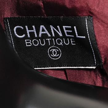 CHANEL, a "Chanel bouclé" jacket.