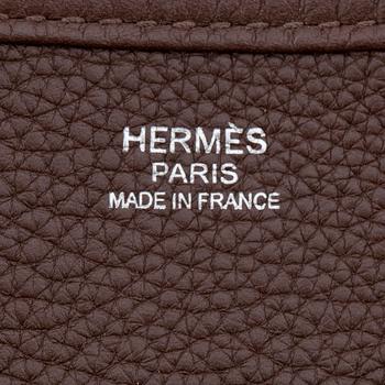 HERMÈS, a taurillon clemence chocolat shoulder bag, "Evelyn III / GM".