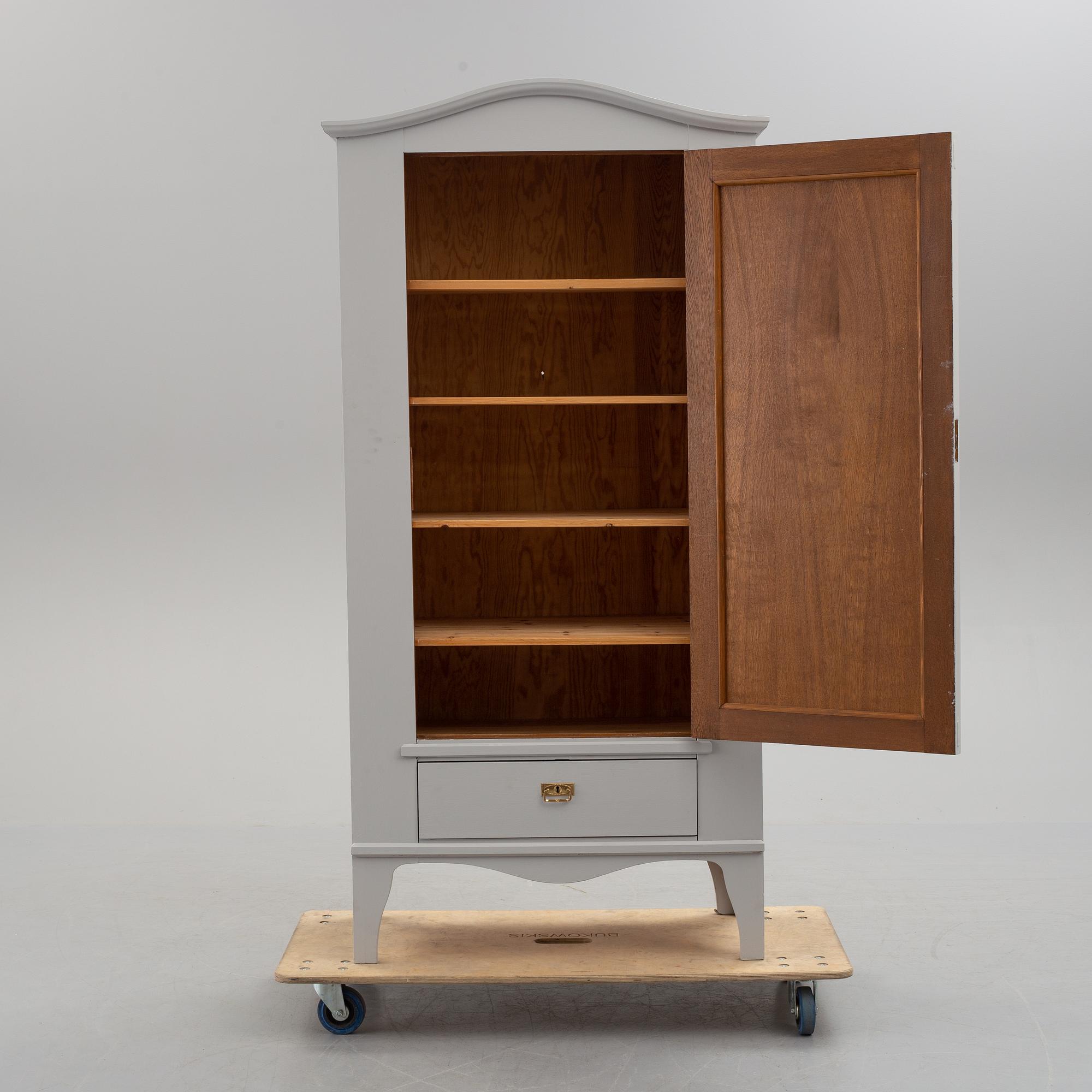 A first half of the 20th century painted cabinet.