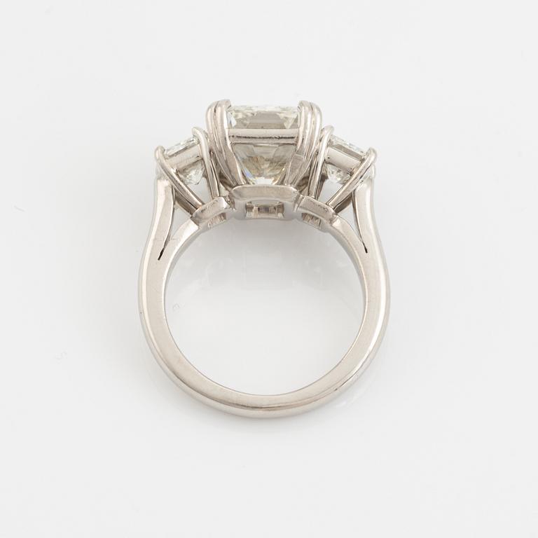 A platinum ring set with a radiant-cut diamond 6.21 ct H vs2, by KWIAT.
