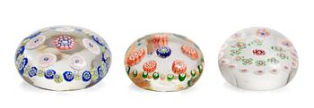 A group of three millefiori paper weights, early 20th Century. (3).