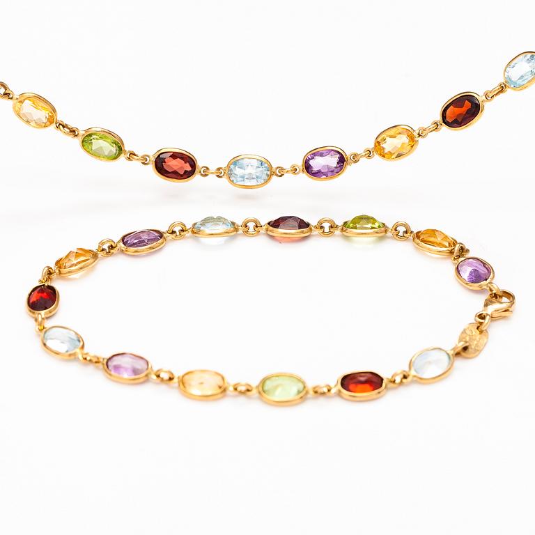 An 18K gold necklace and bracelet with garnets, peridotes, topazes, citrines and amethysts. Le-Gi, Italy.