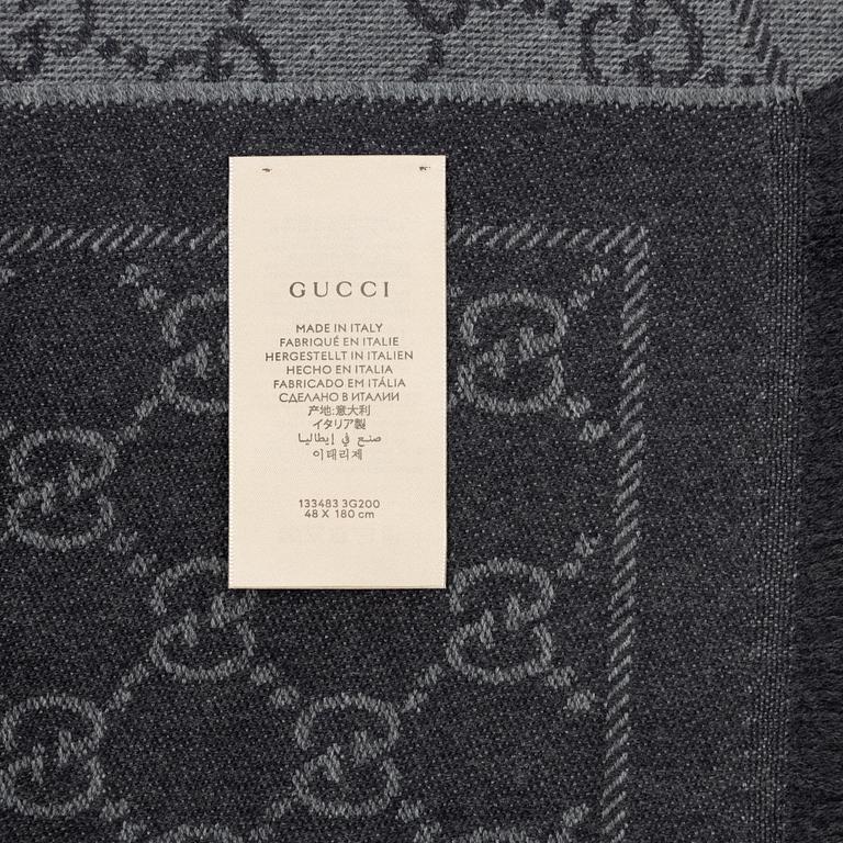 Gucci, a wool 'GG Jaquard Knitted Scarf'.