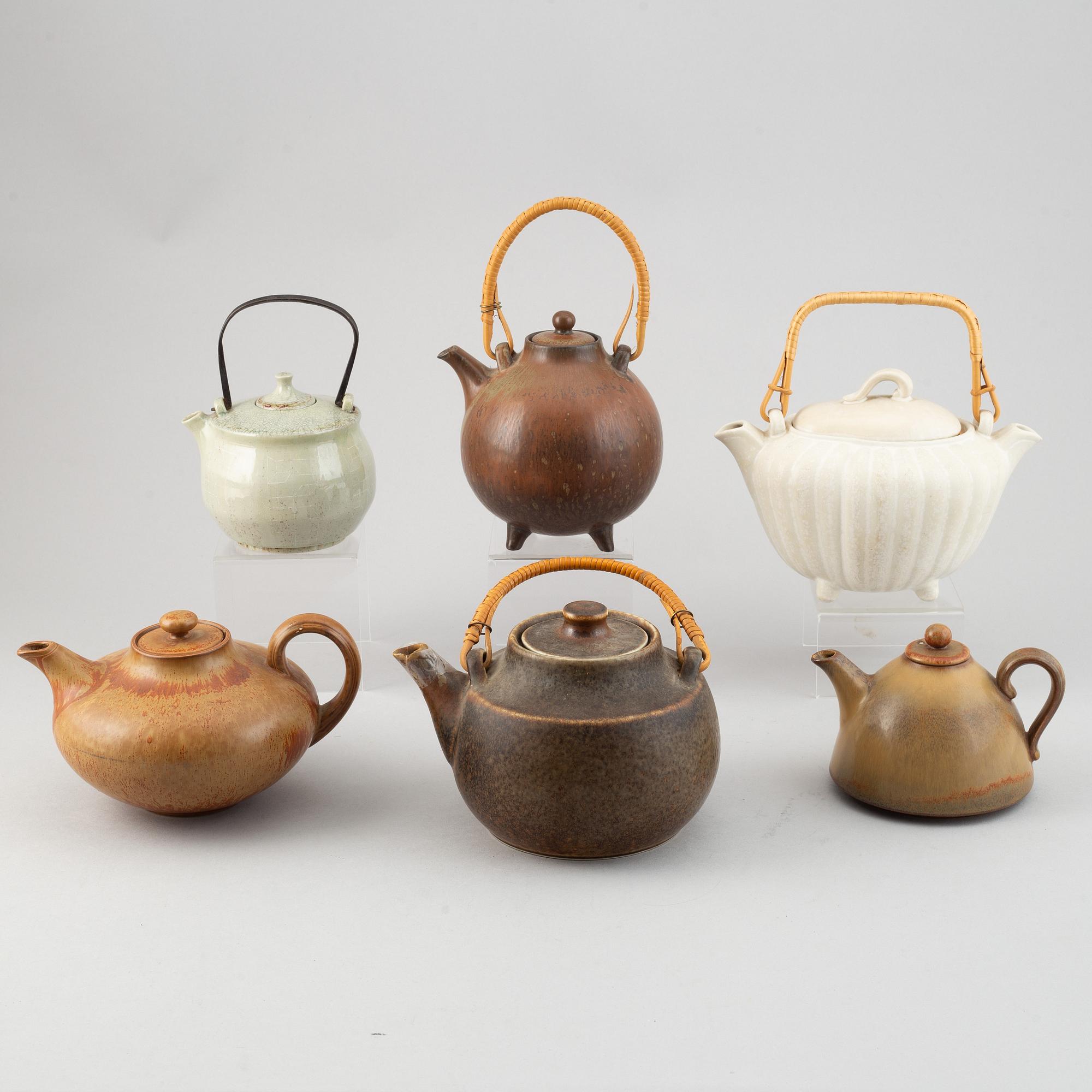 Gunnar Nylund, a set of four stoneware teapots and Carl-Harry Stålhane, two teapots, Rörstrand.