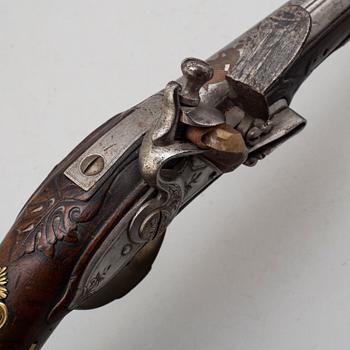 A Flintlock pistol by Friedrich Carlson (Dresden 1700-1719).