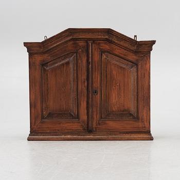 A Swedish wall cabinet, 18th century.