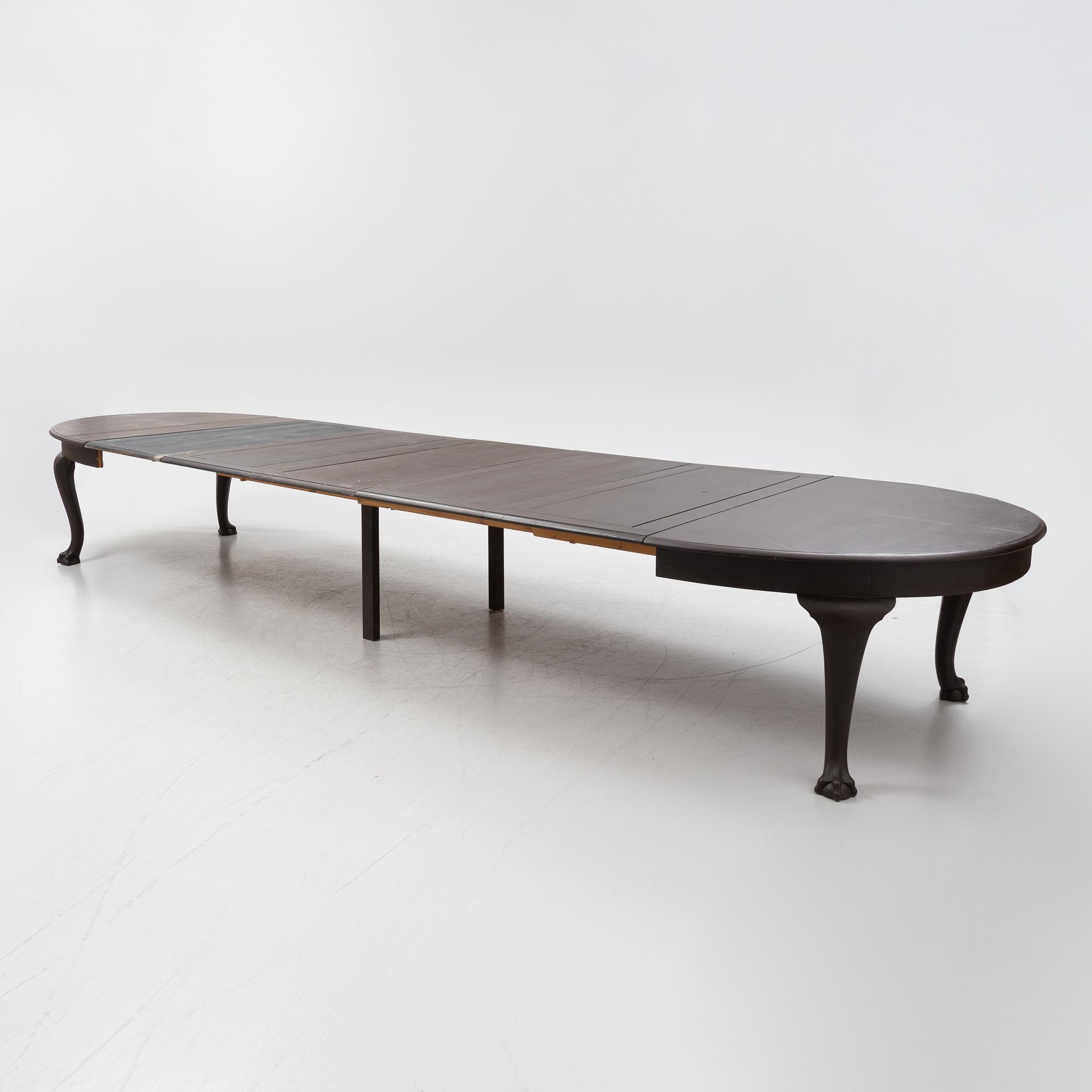 A painted  late Baroque style dining table, early 20th Century.